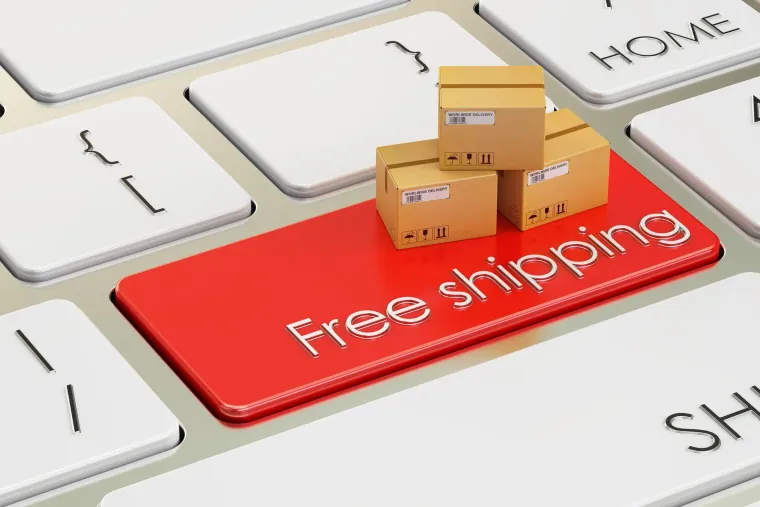 Free Shipping concept on red keyboard button, 3D rendering - Bright Plugins Kostenloser Versand WooCommerce